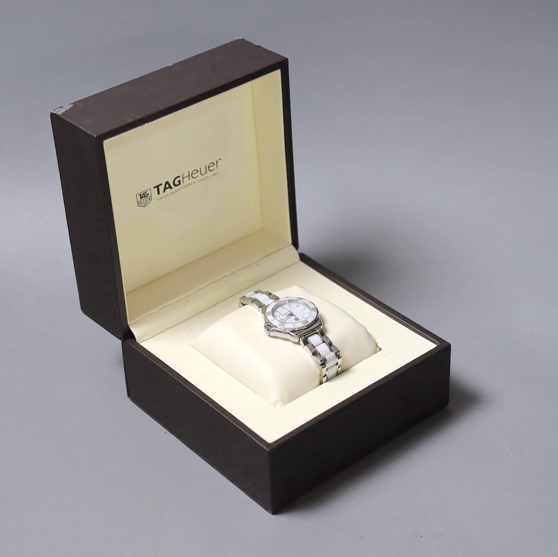 A lady's Tag Heuer Formula One quartz wristwatch (with box and receipt).